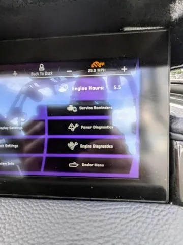 Slide: The Image of 2023 Nautique Super Air Nautique GS20 dashboard display showing engine hours and diagnostics. - 29