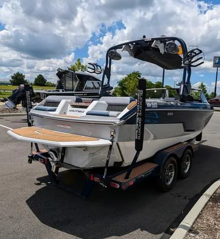 Slide: The Image of 2023 Nautique Super Air Nautique GS20 boat on trailer in parking lot. - 6
