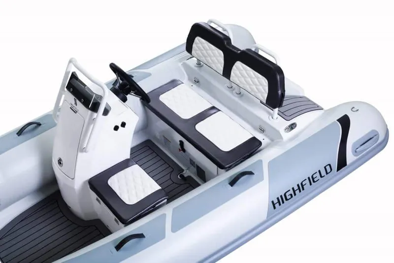 Slide: The Image of 2024 Highfield Sport 360 inflatable boat with white and black seating. - 5