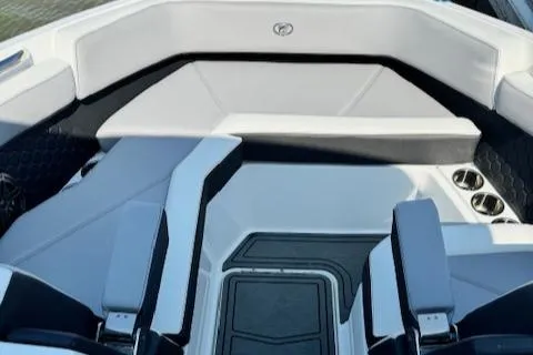 Slide: The Image of 2022 Cobalt R6 Surf boat interior with white and black seating. - 14
