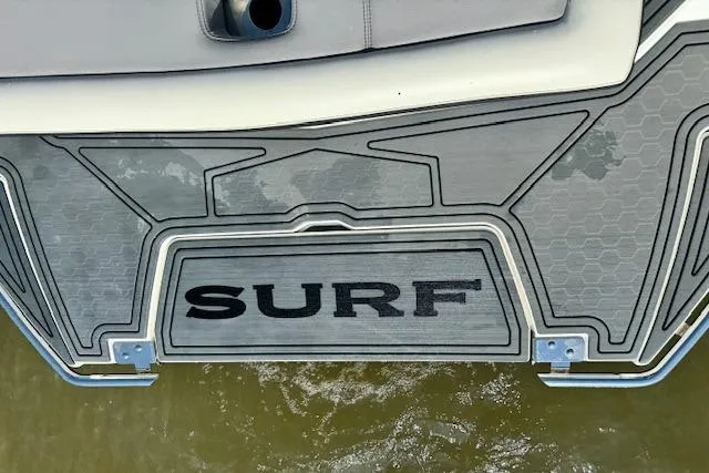 Slide: The Image of 2022 Cobalt R6 Surf boat deck with SURF text. - 27