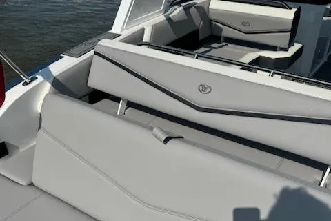 Slide: The Image of 2022 Cobalt R6 Surf boat interior with luxurious seating. - 28