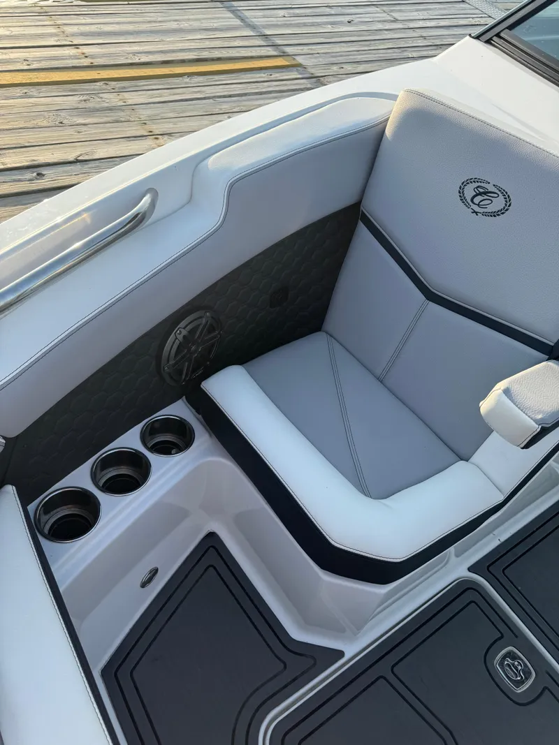 Slide: The Image of 2022 Cobalt R6 Surf boat interior with sleek seating and cup holders. - 38