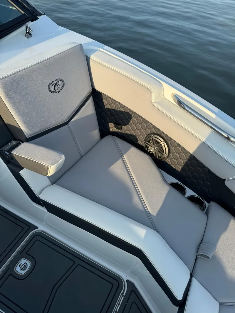 Slide: The Image of 2022 Cobalt R6 Surf boat interior with gray seating and stylish design. - 39