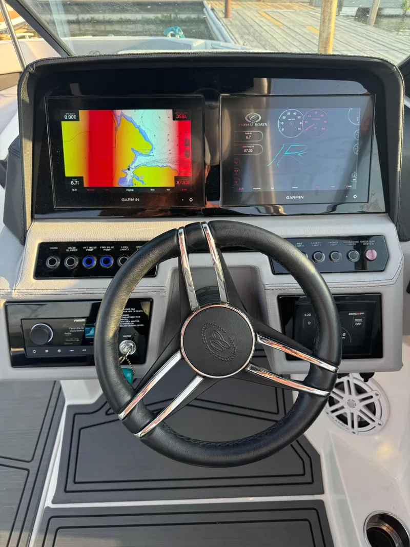 Slide: The Image of 2022 Cobalt R6 Surf dashboard with advanced navigation and control systems. - 41
