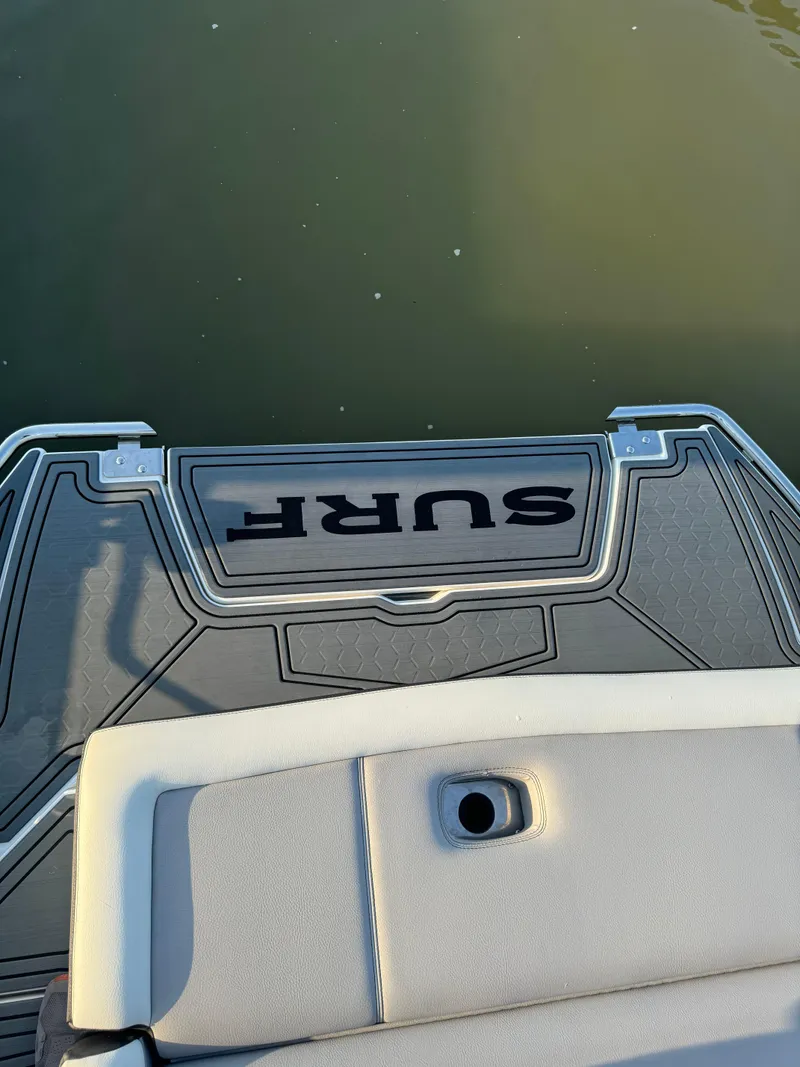 Slide: The Image of 2022 Cobalt R6 Surf boat platform on calm water. - 45