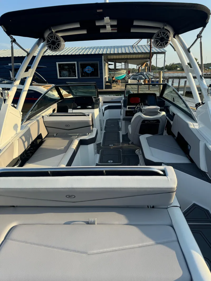 Slide: The Image of 2022 Cobalt R6 Surf boat interior with sleek seating and modern design. - 46