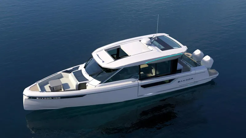 Slide: The Image of 2025 Saxdor 400 GTC luxury motor yacht on calm water. - 0