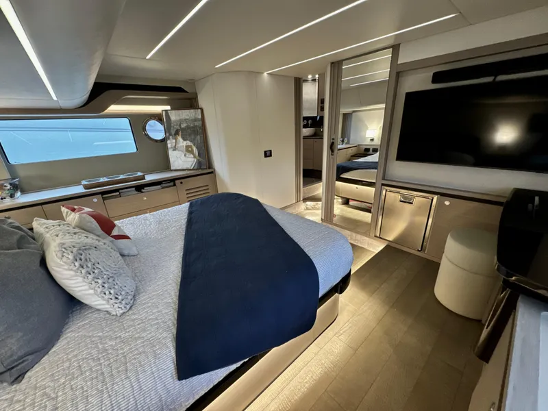 Slide: The Image of Luxurious interior of 2023 Absolute 52 Navetta yacht with modern design and elegant furnishings. - 15