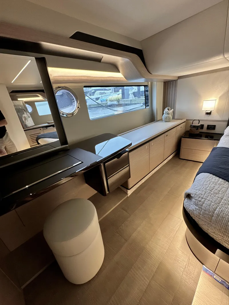 Slide: The Image of Luxurious interior of 2023 Absolute 52 Navetta yacht with modern furnishings and elegant design. - 17
