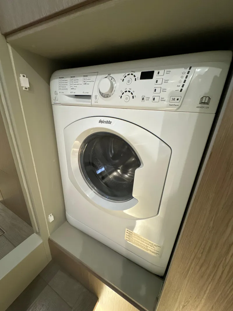 Slide: The Image of Washing machine in 2023 Absolute 52 Navetta yacht interior. - 19