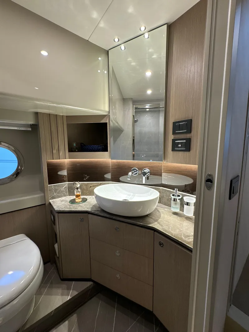 Slide: The Image of Luxurious bathroom in 2023 Absolute 52 Navetta yacht with modern fixtures and elegant design. - 20