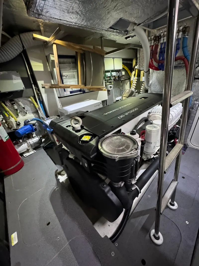 Slide: The Image of Engine room of 2023 Absolute 52 Navetta yacht, featuring Volvo Penta engine. - 40
