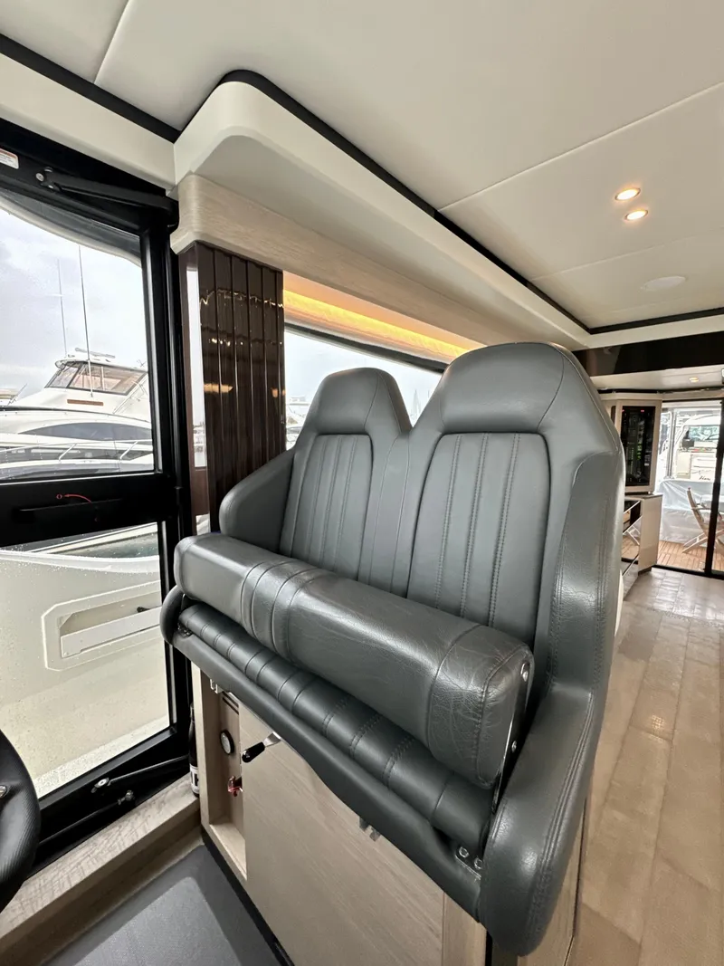 Slide: The Image of Luxurious interior seating on 2023 Absolute 52 Navetta yacht. - 6