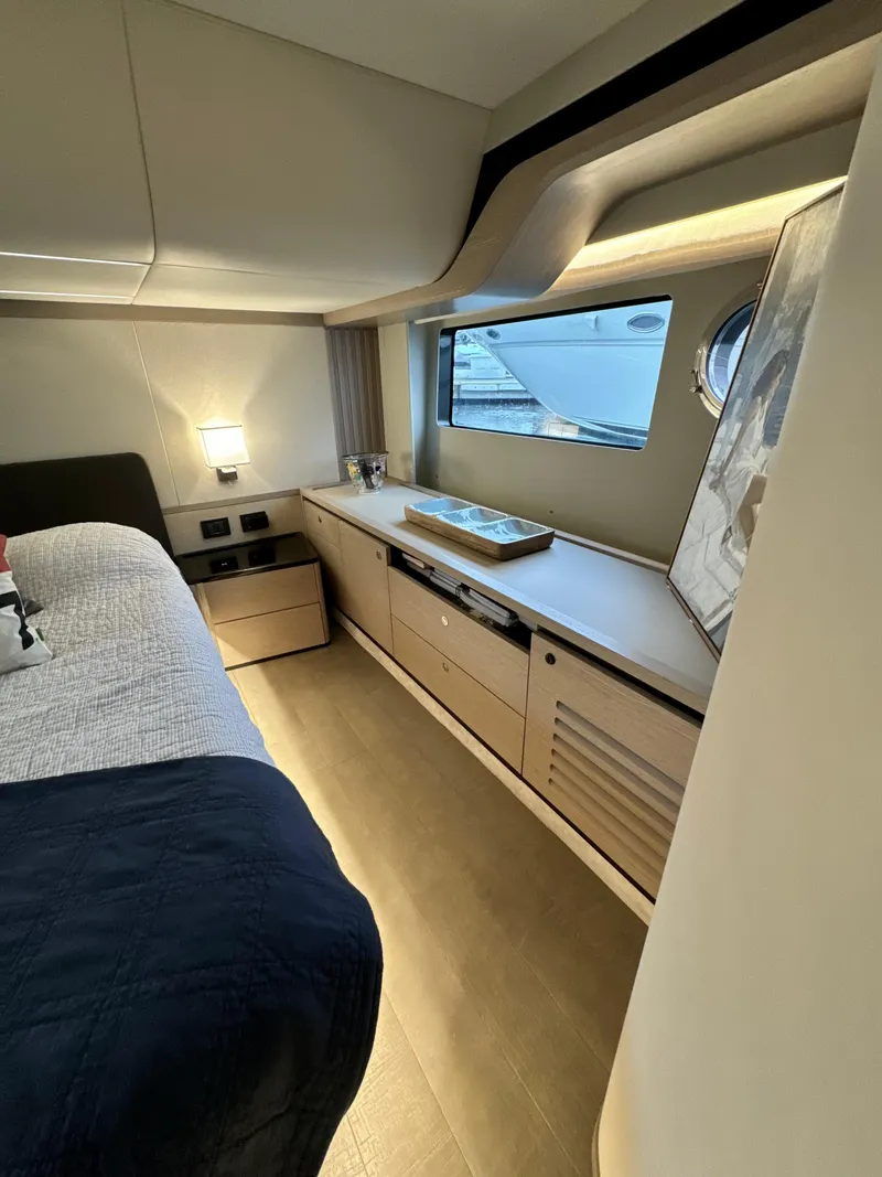 Slide: The Image of Luxurious cabin interior of 2023 Absolute 52 Navetta yacht with modern furnishings. - 16