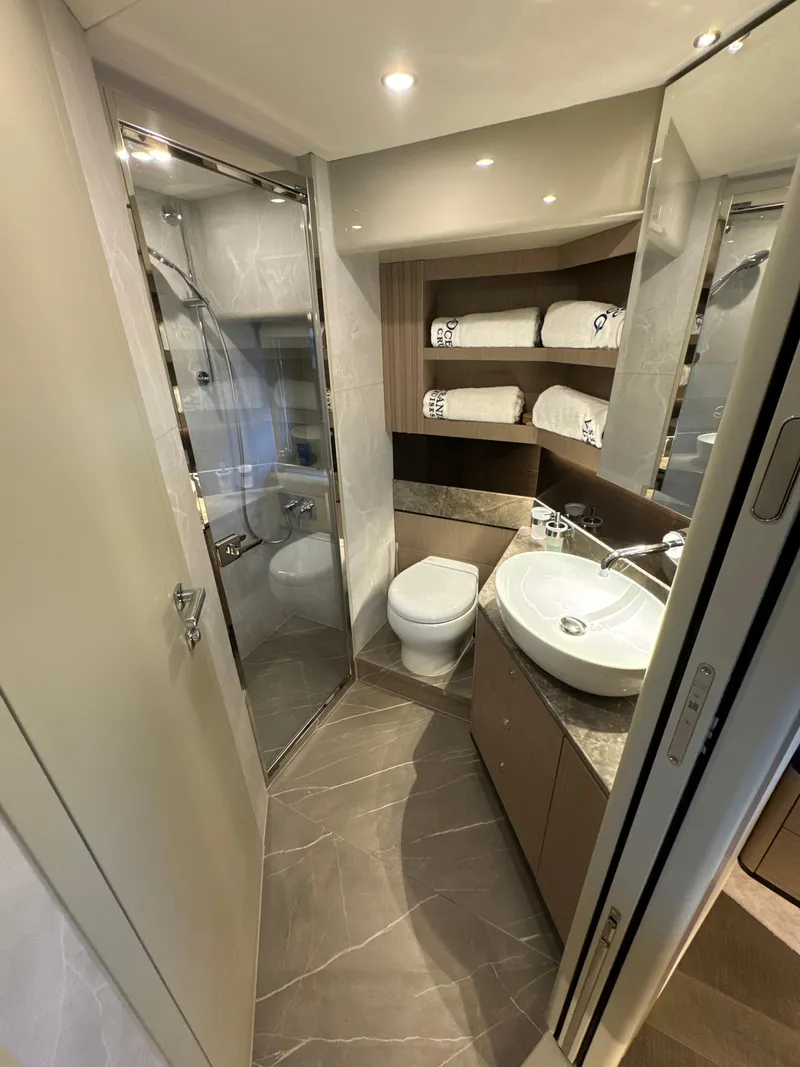 Slide: The Image of Luxurious bathroom in 2023 Absolute 52 Navetta yacht with modern fixtures and elegant design. - 25