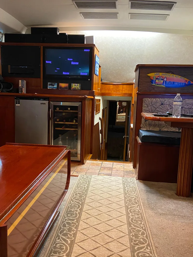 Slide: The Image of Interior of 1988 Ocean Yachts 55 Super Sport with wood finishes and modern amenities. - 11