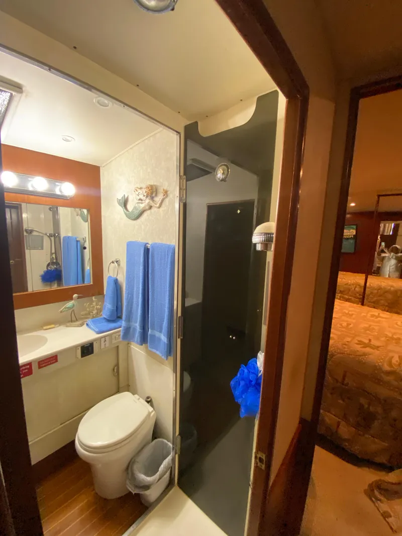 Slide: The Image of Bathroom interior of 1988 Ocean Yachts 55 Super Sport with shower and vanity. - 25