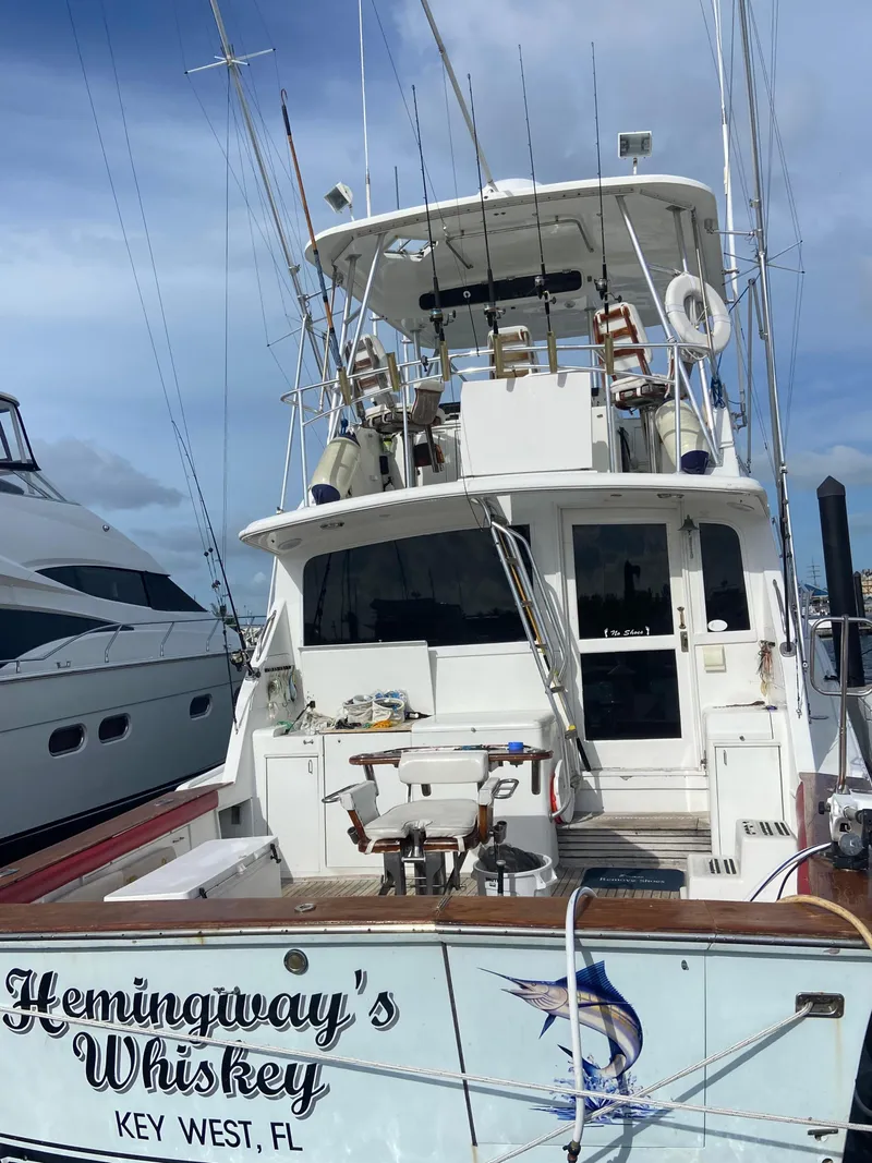 Slide: The Image of 1988 Ocean Yachts 55 Super Sport docked, named "Hemingway's Whiskey," Key West, FL. - 3