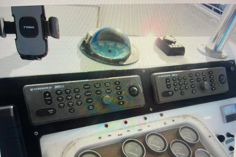 Slide: The Image of Control panel of 1988 Ocean Yachts 55 Super Sport with navigation instruments. - 41