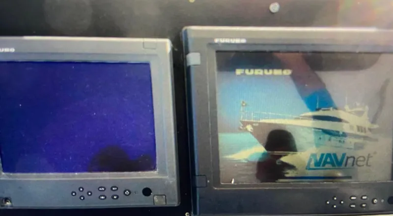 Slide: The Image of Furuno navigation screens on 1988 Ocean Yachts 55 Super Sport. - 42