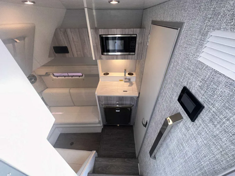 Slide: The Image of 2025 Formula 387 Center Console Fish boat with Mercury engine, featuring spacious deck layout. - 1