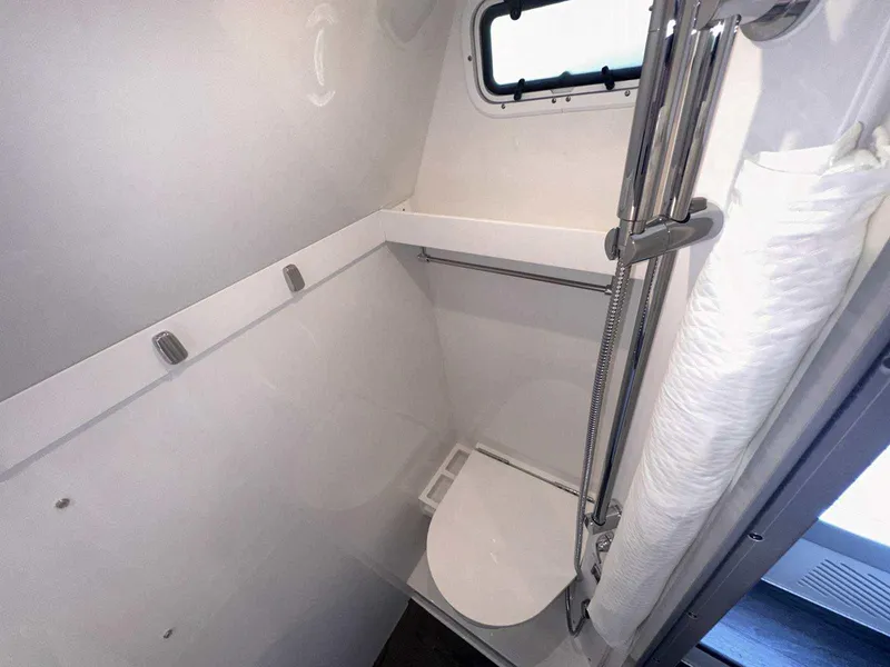 Slide: The Image of 2025 Formula 387 Center Console Fish boat interior with luxurious seating and ambient lighting. - 26