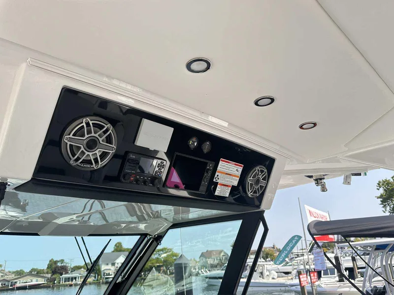 Slide: The Image of Luxurious seating on 2025 Formula 387 Center Console Fish boat, featuring plush white upholstery. - 30