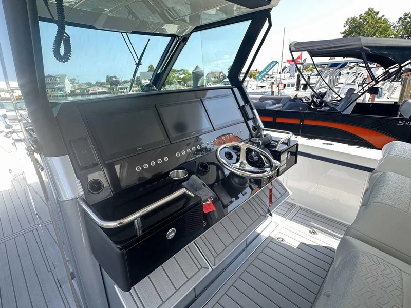 Slide: The Image of 2025 Formula 387 Center Console Fish dashboard with advanced navigation and control systems. - 32