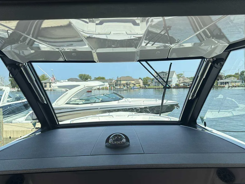 Slide: The Image of 2025 Formula 387 Center Console Fish boat with sleek windshield and modern design. - 34