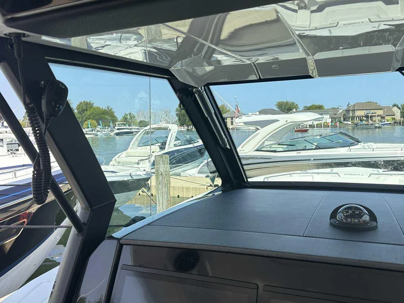 Slide: The Image of 2025 Formula 387 Center Console Fish dashboard with advanced navigation displays and controls. - 35