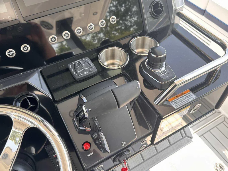 Slide: The Image of 2025 Formula 387 Center Console Fish dashboard with advanced navigation and control systems. - 37