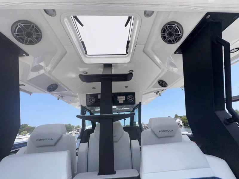 Slide: The Image of Control panel of 2025 Formula 387 Center Console Fish with speaker and electronic devices. - 40