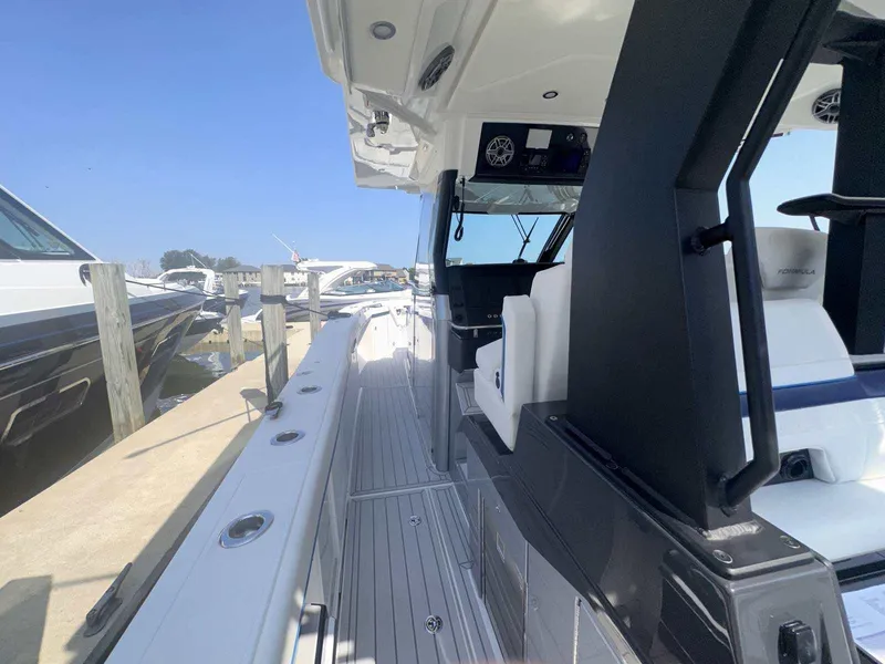 Slide: The Image of Open storage drawer on 2025 Formula 387 Center Console Fish boat. - 41