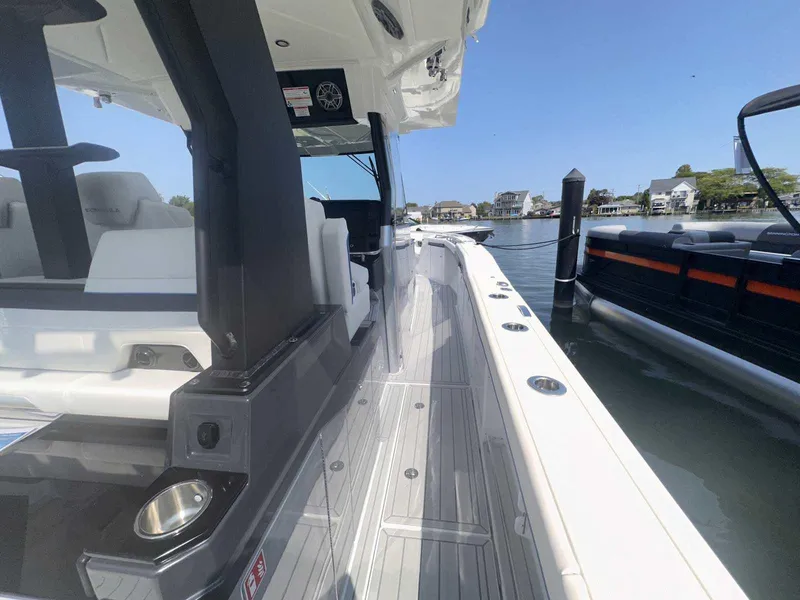 Slide: The Image of Control panel of 2025 Formula 387 Center Console Fish with seat adjustment buttons. - 42