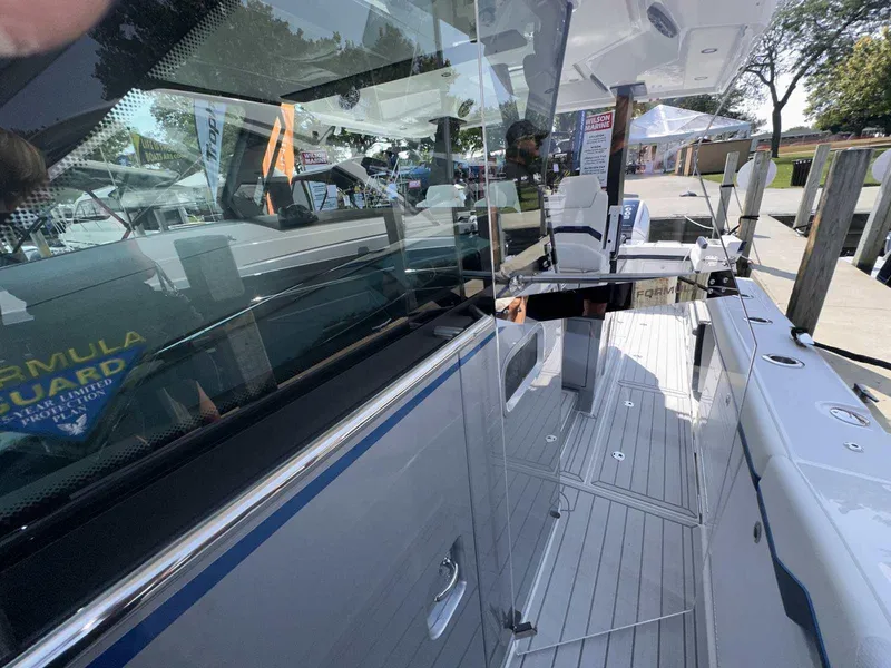 Slide: The Image of 2025 Formula 387 Center Console Fish bathroom with modern sink and toilet design. - 48