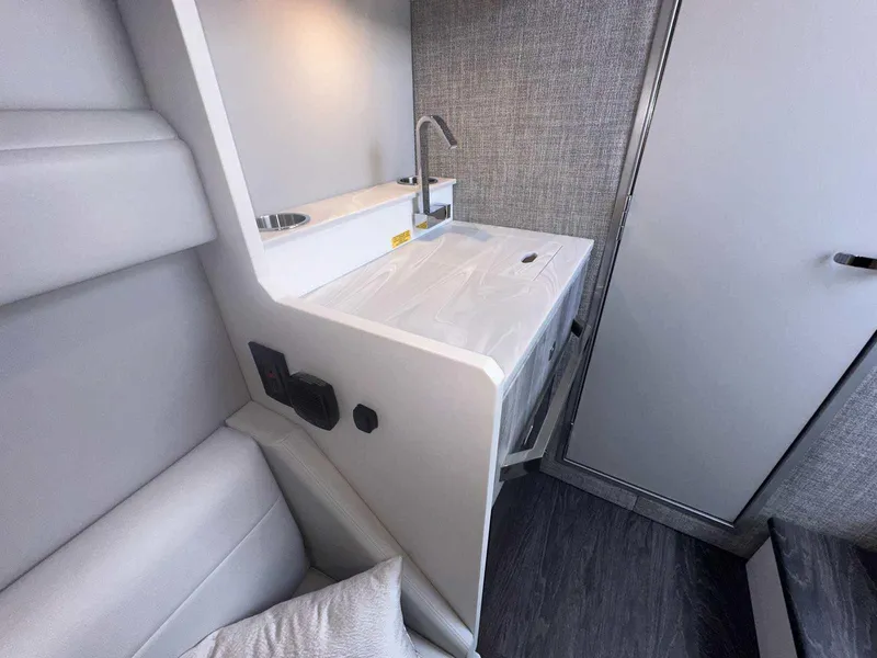 Slide: The Image of 2025 Formula 387 Center Console Fish boat interior with speakers and safety features. - 5