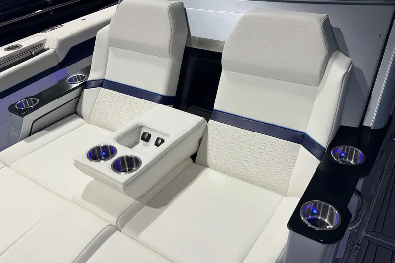 Slide: The Image of 2025 Formula 387 Center Console Fish boat seats with cup holders and modern design. - 53