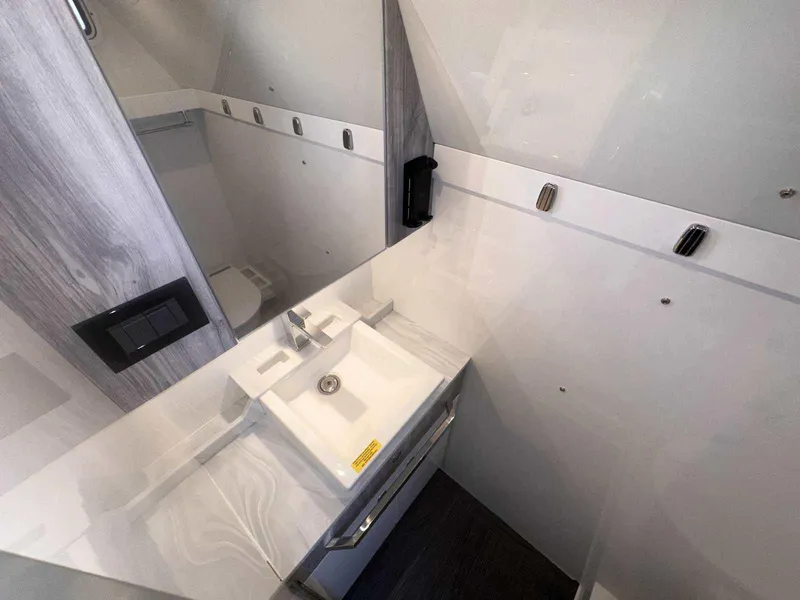 Slide: The Image of 2025 Formula 387 Center Console Fish boat with dual livewells on deck. - 6