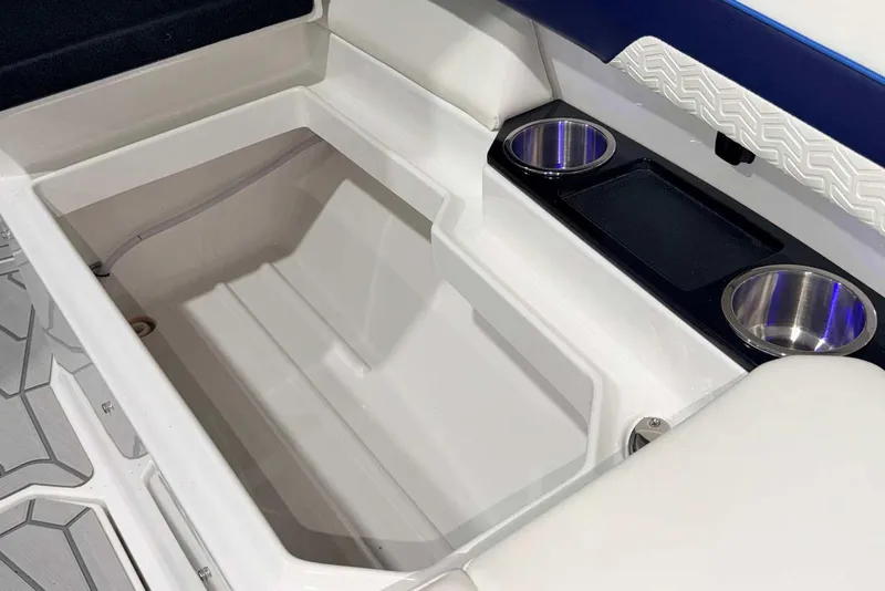 Slide: The Image of 2025 Formula 387 Center Console Fish boat interior with storage and cup holders. - 66