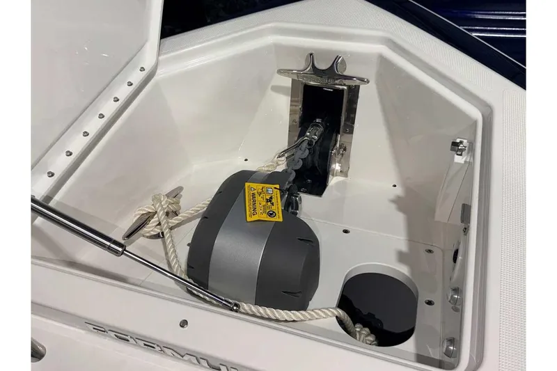 Slide: The Image of 2025 Formula 387 Center Console Fish anchor compartment with rope and winch system. - 67