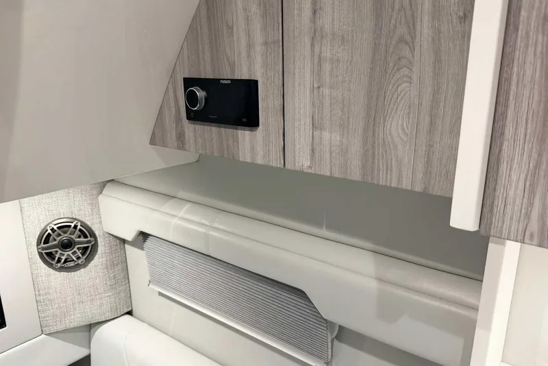 Slide: The Image of Interior of 2025 Formula 387 Center Console Fish with speaker and control panel. - 77