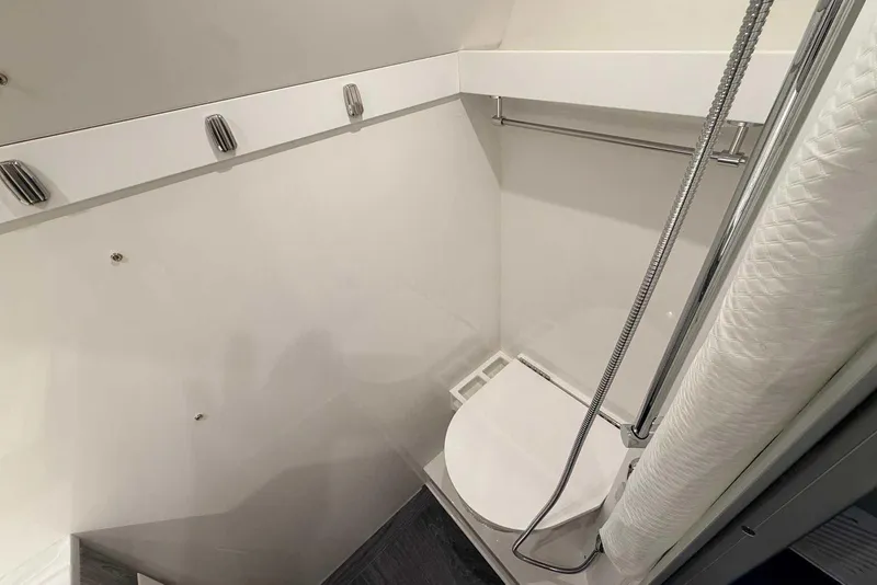 Slide: The Image of 2025 Formula 387 Center Console Fish bathroom with modern fixtures and sleek design. - 90