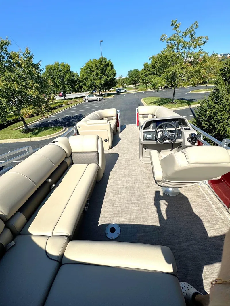Slide: The Image of 2024 Sun Tracker Party Barge 20 DLX pontoon boat with spacious seating and modern design. - 3