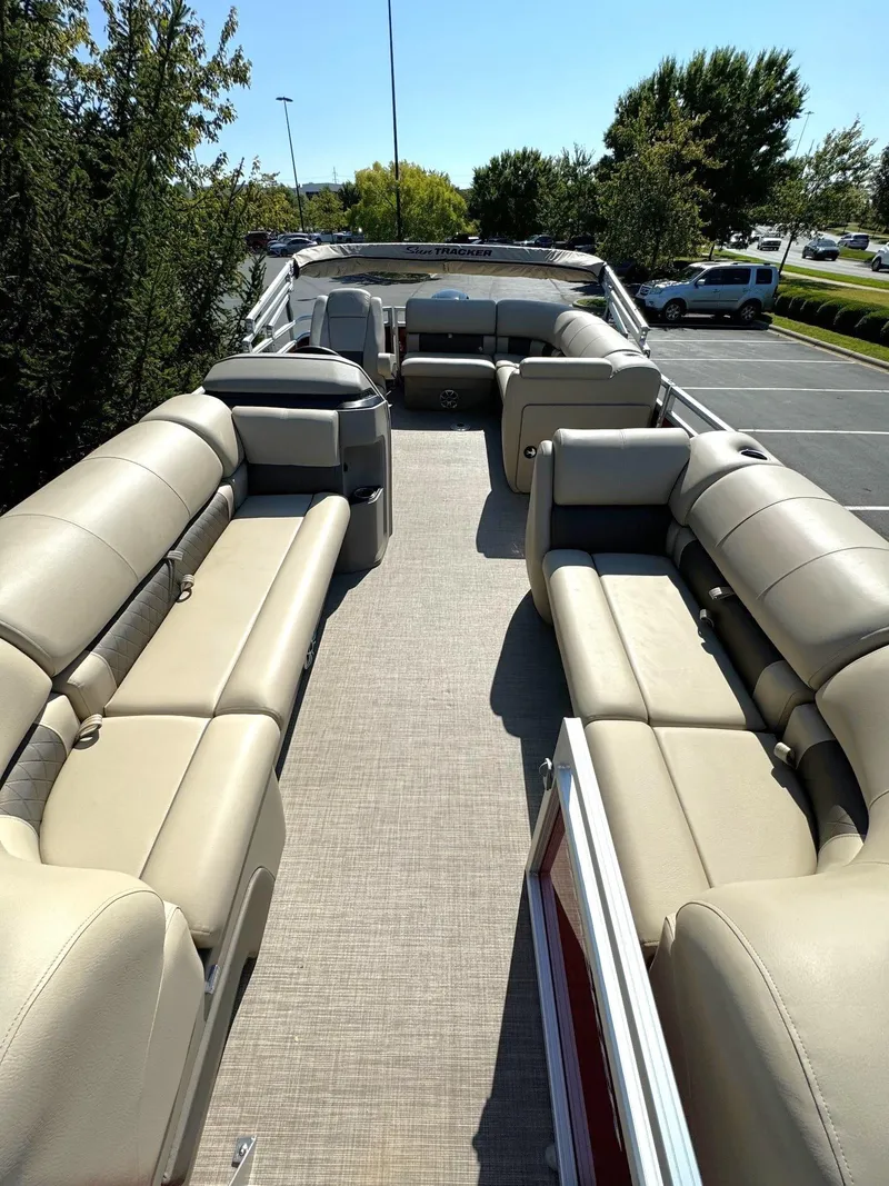 Slide: The Image of 2024 Sun Tracker Party Barge 20 DLX pontoon boat with spacious seating and modern design. - 4