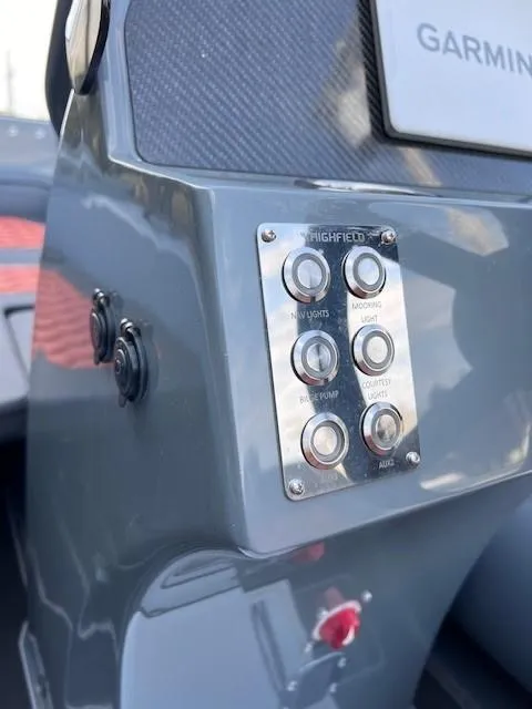 Slide: The Image of Control panel of 2023 Highfield Sport 390 boat with Garmin system. - 6