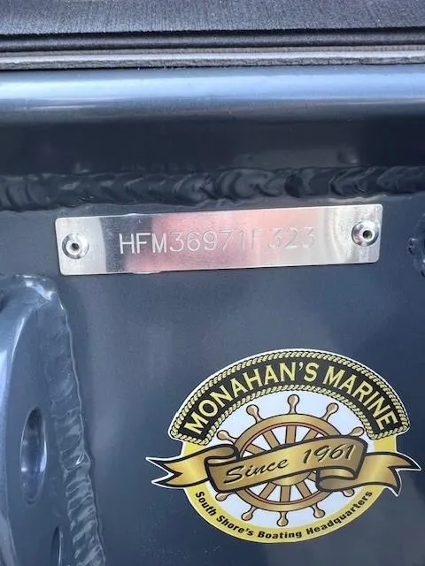 Slide: The Image of Highfield Sport 390 boat, 2023 model, Monahan's Marine sticker, serial number plate visible. - 7