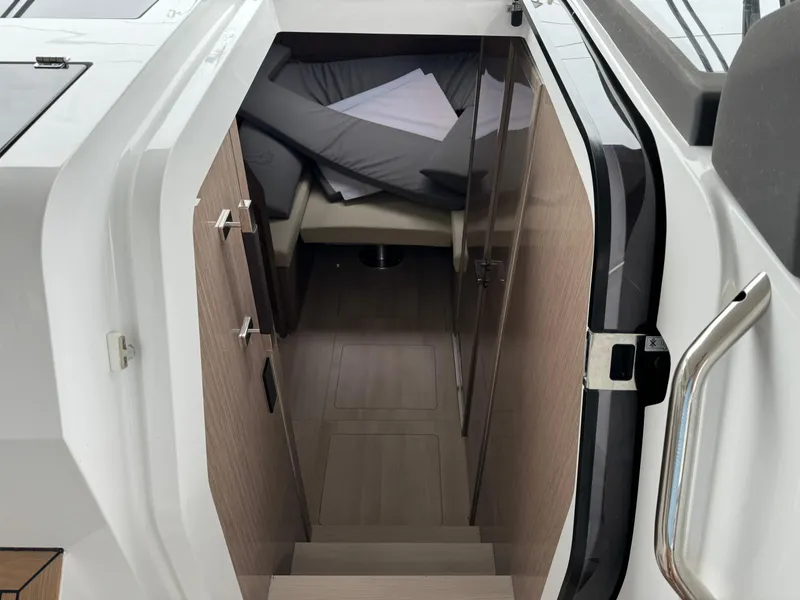 Slide: The Image of Interior cabin view of 2024 Sealine S335V boat, featuring modern design and comfortable seating. - 20