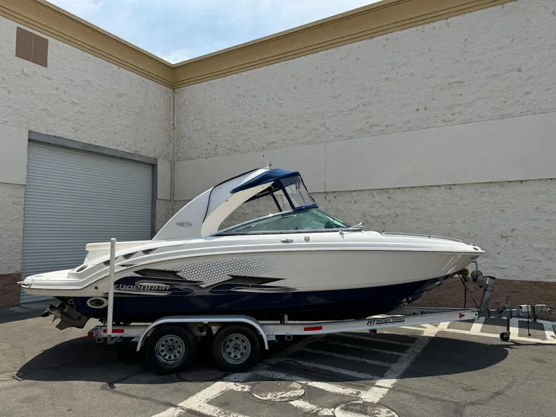 The Image of 2009 Chaparral SSX 236 boat on trailer, parked outdoors. - 0