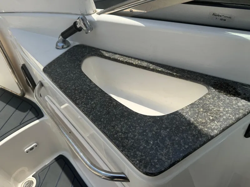 Slide: The Image of 2009 Chaparral SSX 236 boat sink with granite countertop. - 18